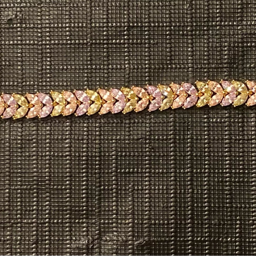 Elegant Gold and Pink Bracelet